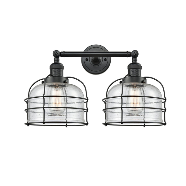Bell Cage Bath Vanity Light shown in the Matte Black finish with a Seedy shade