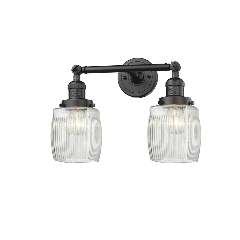 Colton Bath Vanity Light shown in the Oil Rubbed Bronze finish with a Clear Halophane shade