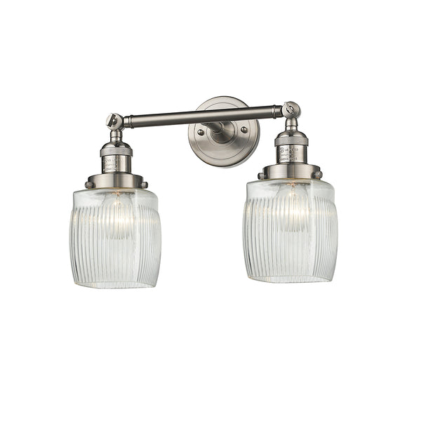 Colton Bath Vanity Light shown in the Brushed Satin Nickel finish with a Clear Halophane shade