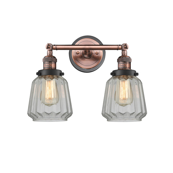 Chatham Bath Vanity Light shown in the Antique Copper finish with a Clear shade