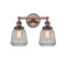 Chatham Bath Vanity Light shown in the Antique Copper finish with a Clear shade