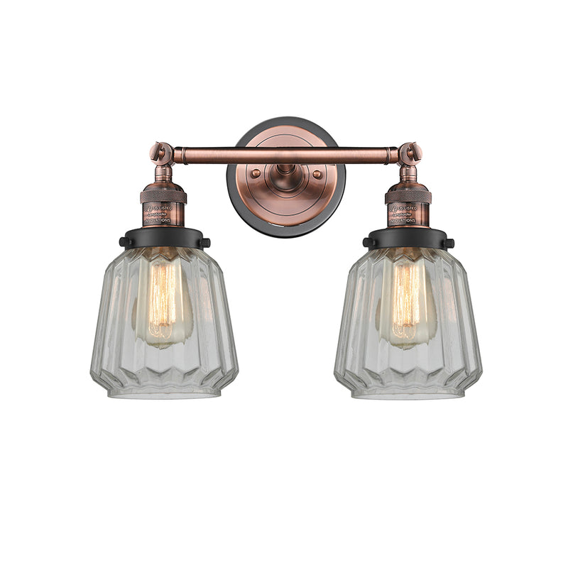 Chatham Bath Vanity Light shown in the Antique Copper finish with a Clear shade