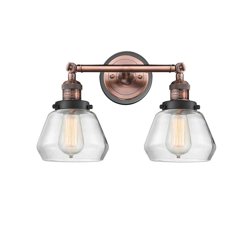 Fulton Bath Vanity Light shown in the Antique Copper finish with a Clear shade