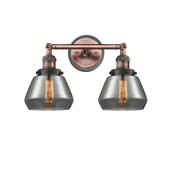Fulton Bath Vanity Light shown in the Antique Copper finish with a Plated Smoke shade