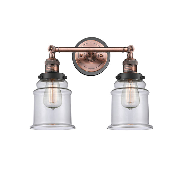 Canton Bath Vanity Light shown in the Antique Copper finish with a Clear shade