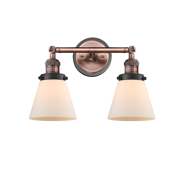 Cone Bath Vanity Light shown in the Antique Copper finish with a Matte White shade