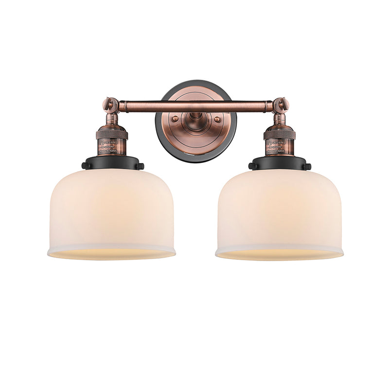 Bell Bath Vanity Light shown in the Antique Copper finish with a Matte White shade