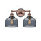 Bell Bath Vanity Light shown in the Antique Copper finish with a Plated Smoke shade