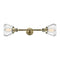 Fulton Bath Vanity Light shown in the Antique Brass finish with a Clear shade