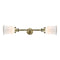 Canton Bath Vanity Light shown in the Antique Brass finish with a Matte White shade