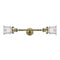 Canton Bath Vanity Light shown in the Antique Brass finish with a Seedy shade