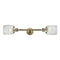 Colton Bath Vanity Light shown in the Antique Brass finish with a Clear Halophane shade