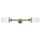 Dover Bath Vanity Light shown in the Antique Brass finish with a Clear shade