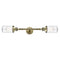 Dover Bath Vanity Light shown in the Antique Brass finish with a Seedy shade