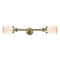Bell Bath Vanity Light shown in the Antique Brass finish with a Matte White shade