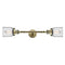 Bell Bath Vanity Light shown in the Antique Brass finish with a Clear shade