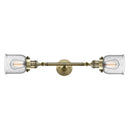 Bell Bath Vanity Light shown in the Antique Brass finish with a Seedy shade