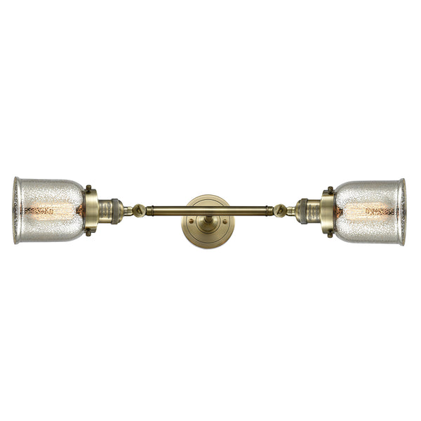 Bell Bath Vanity Light shown in the Antique Brass finish with a Silver Plated Mercury shade