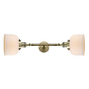 Bell Bath Vanity Light shown in the Antique Brass finish with a Matte White shade
