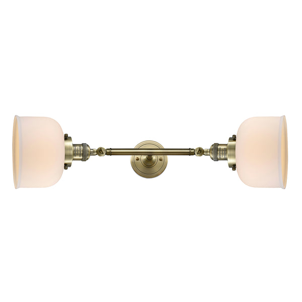 Bell Bath Vanity Light shown in the Antique Brass finish with a Matte White shade