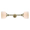 Bell Bath Vanity Light shown in the Antique Brass finish with a Matte White shade
