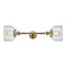 Bell Bath Vanity Light shown in the Antique Brass finish with a Clear shade