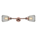 Chatham Bath Vanity Light shown in the Antique Copper finish with a Clear shade