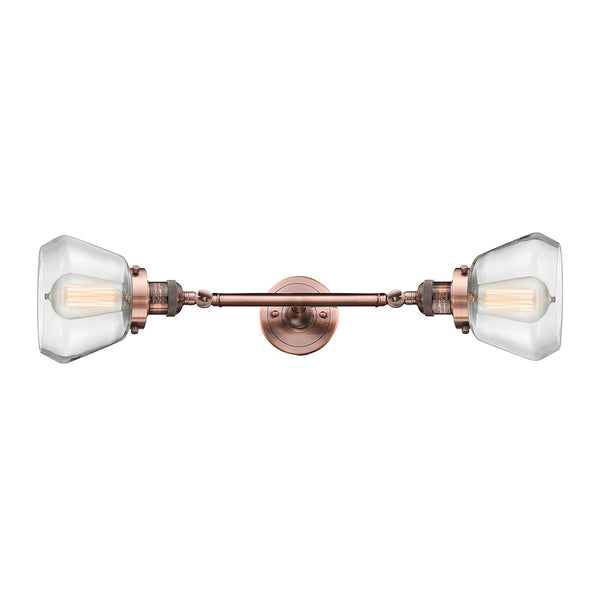 Fulton Bath Vanity Light shown in the Antique Copper finish with a Clear shade
