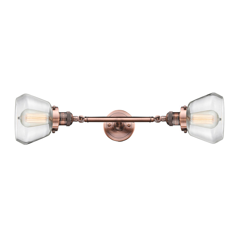 Fulton Bath Vanity Light shown in the Antique Copper finish with a Clear shade