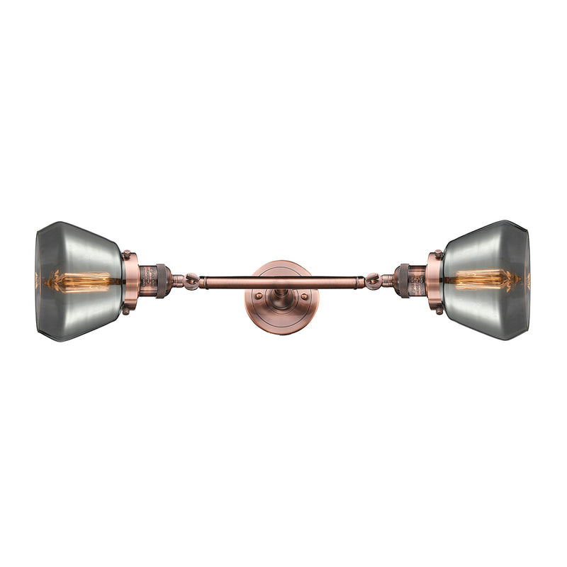 Fulton Bath Vanity Light shown in the Antique Copper finish with a Plated Smoke shade