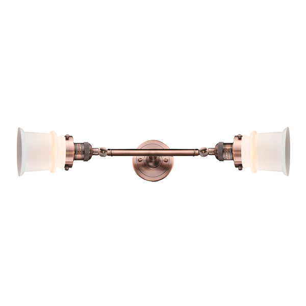 Canton Bath Vanity Light shown in the Antique Copper finish with a Matte White shade