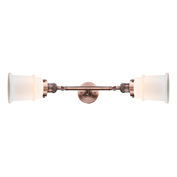 Canton Bath Vanity Light shown in the Antique Copper finish with a Matte White shade
