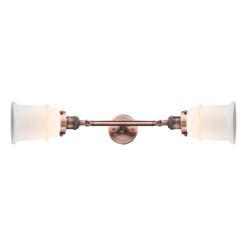 Canton Bath Vanity Light shown in the Antique Copper finish with a Matte White shade