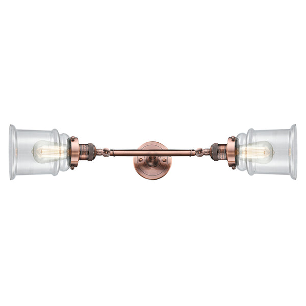 Canton Bath Vanity Light shown in the Antique Copper finish with a Clear shade