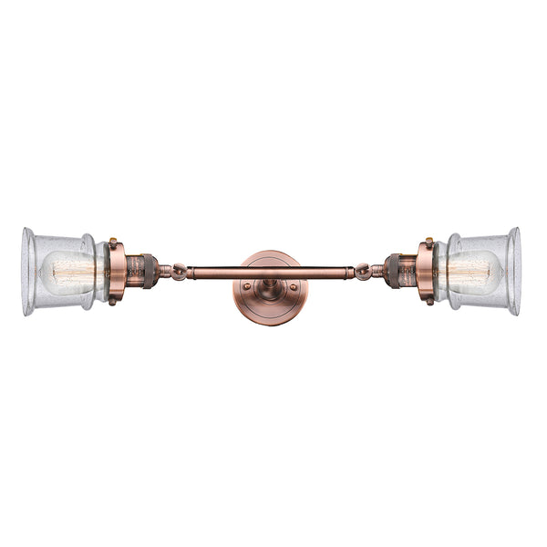 Canton Bath Vanity Light shown in the Antique Copper finish with a Seedy shade