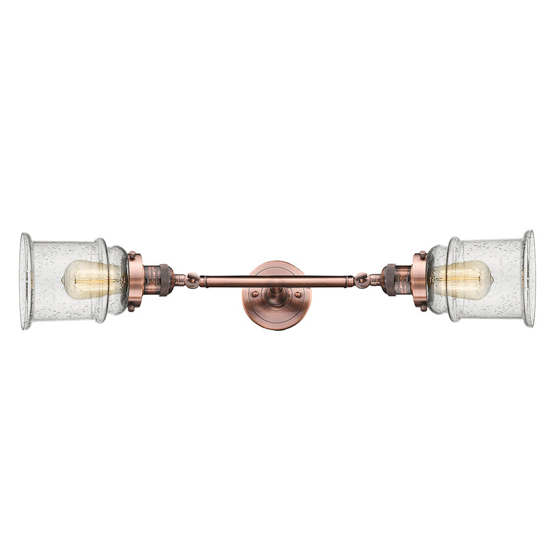Canton Bath Vanity Light shown in the Antique Copper finish with a Seedy shade