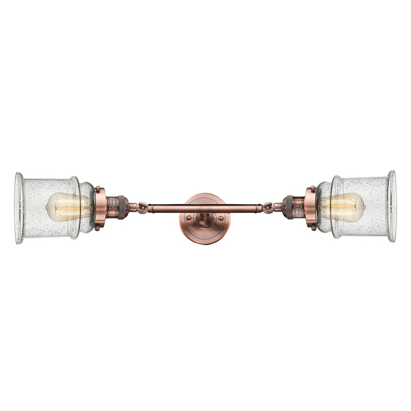 Canton Bath Vanity Light shown in the Antique Copper finish with a Seedy shade