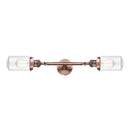 Dover Bath Vanity Light shown in the Antique Copper finish with a Clear shade