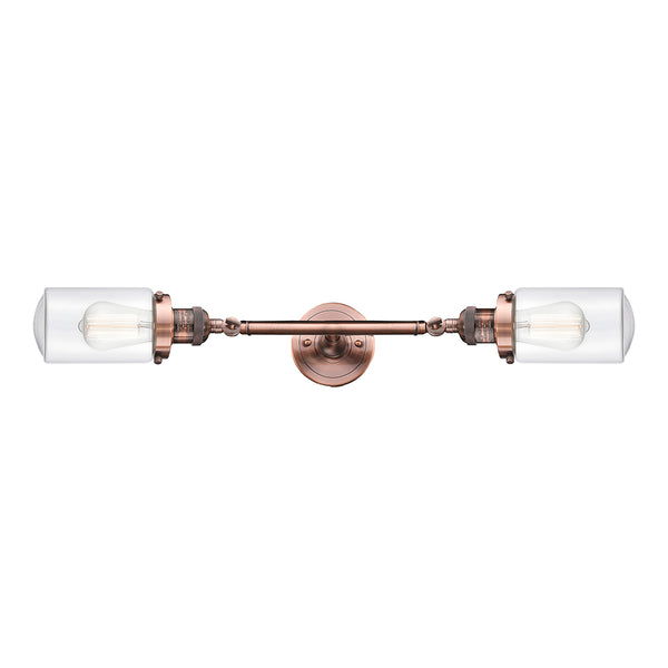 Dover Bath Vanity Light shown in the Antique Copper finish with a Clear shade