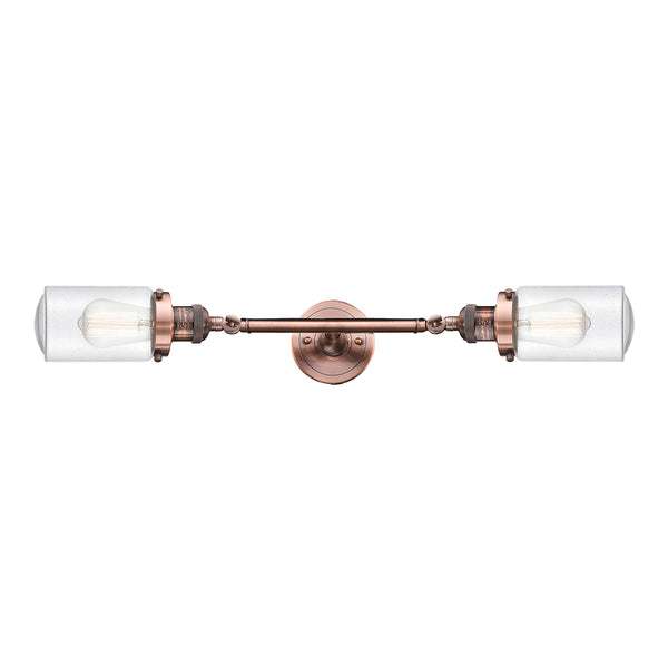 Dover Bath Vanity Light shown in the Antique Copper finish with a Seedy shade