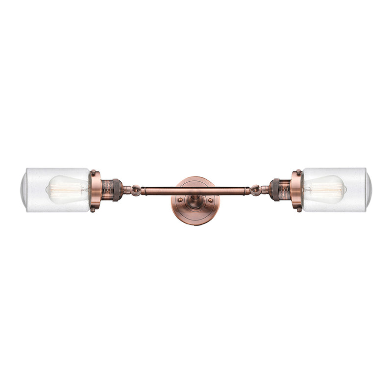 Dover Bath Vanity Light shown in the Antique Copper finish with a Seedy shade