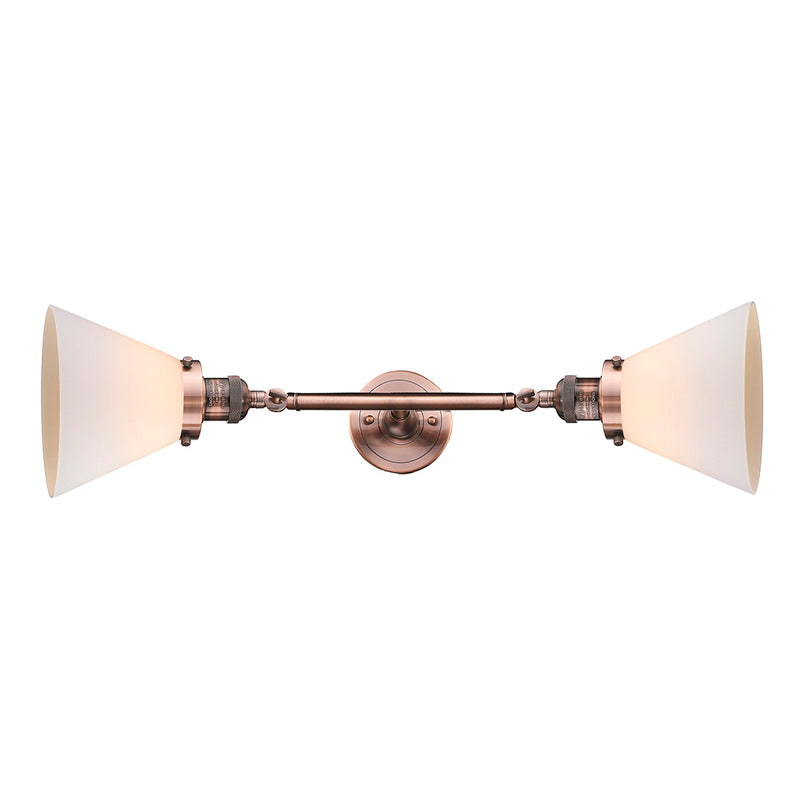 Cone Bath Vanity Light shown in the Antique Copper finish with a Matte White shade