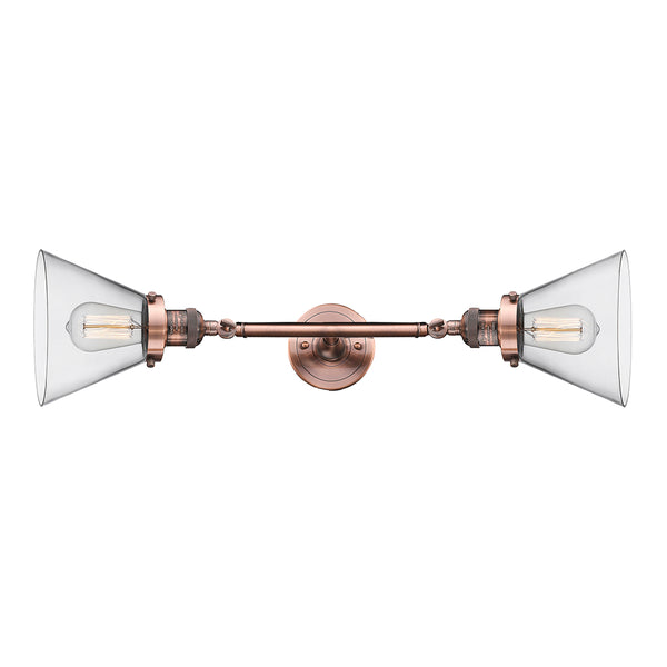 Cone Bath Vanity Light shown in the Antique Copper finish with a Clear shade