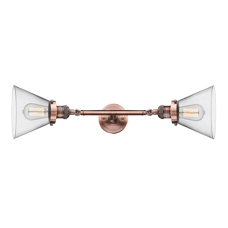 Cone Bath Vanity Light shown in the Antique Copper finish with a Clear shade