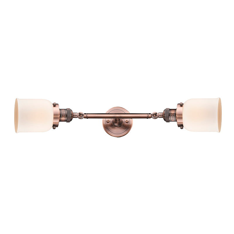 Bell Bath Vanity Light shown in the Antique Copper finish with a Matte White shade