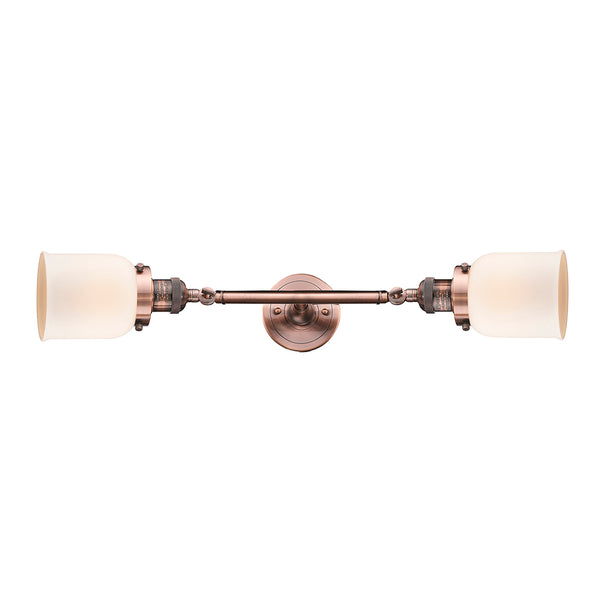 Bell Bath Vanity Light shown in the Antique Copper finish with a Matte White shade
