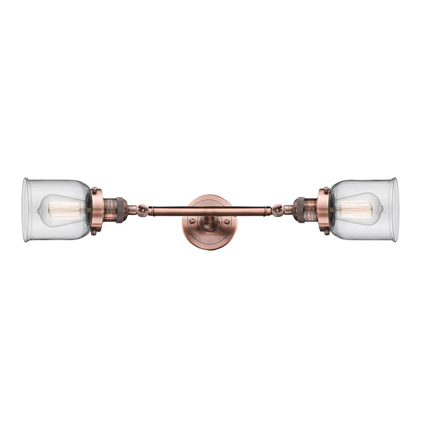 Bell Bath Vanity Light shown in the Antique Copper finish with a Clear shade