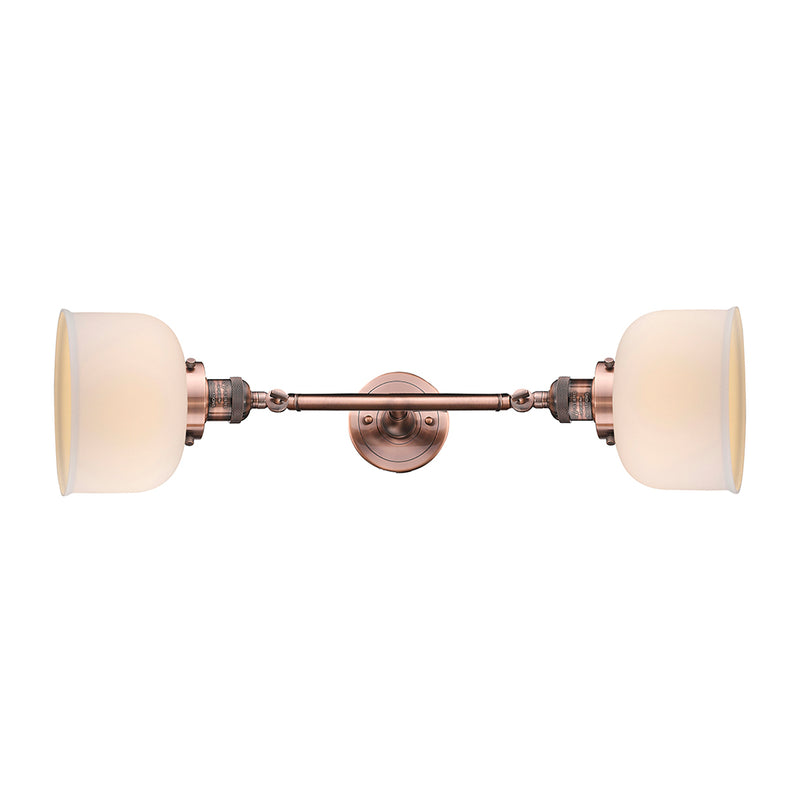 Bell Bath Vanity Light shown in the Antique Copper finish with a Matte White shade