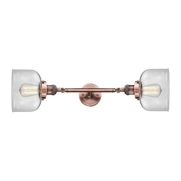Bell Bath Vanity Light shown in the Antique Copper finish with a Clear shade