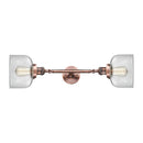 Bell Bath Vanity Light shown in the Antique Copper finish with a Clear shade